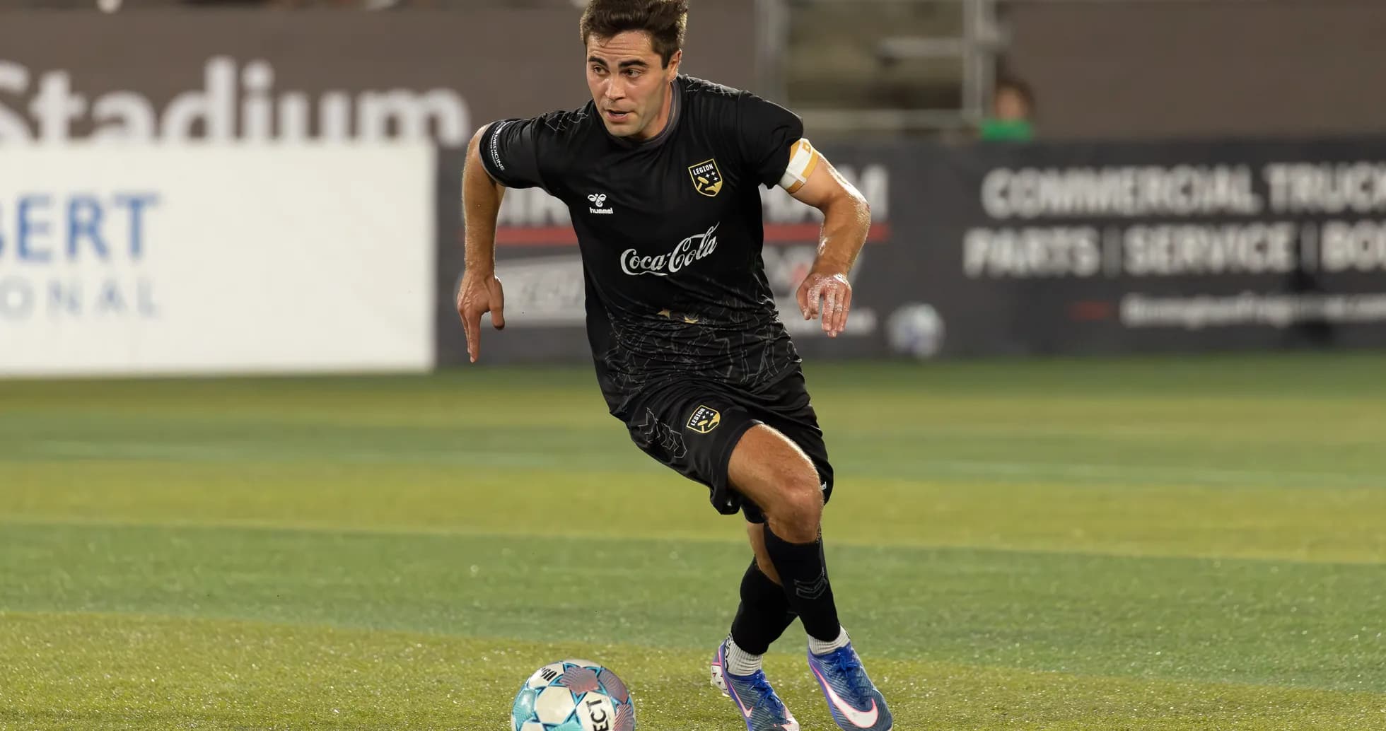 Player dribbling the ball during match