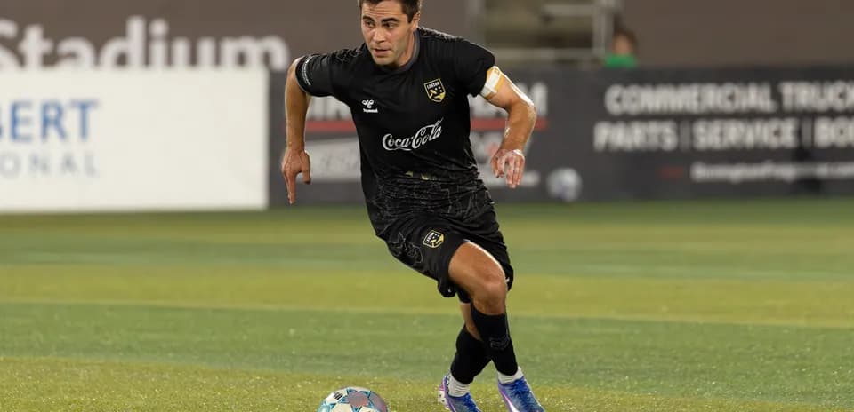 Player dribbling the ball during match
