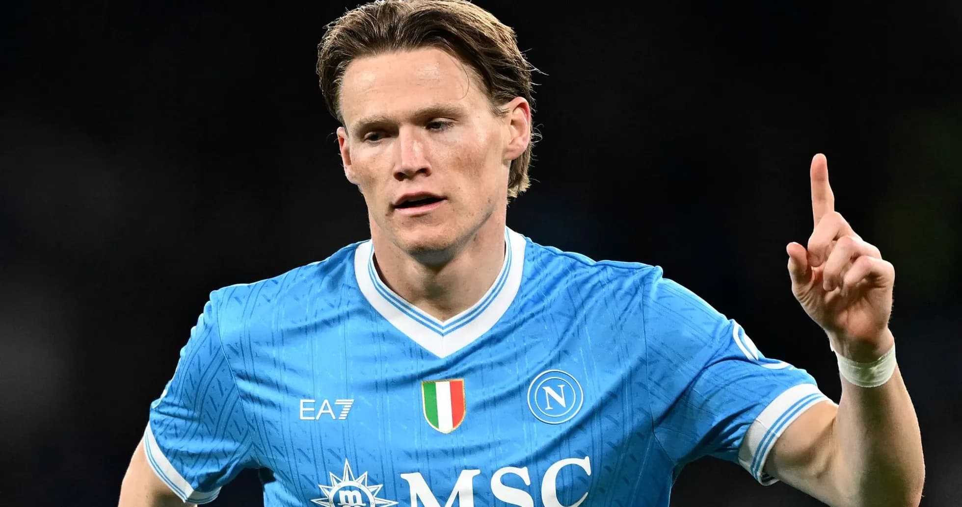 Player celebrating a goal in Napoli jersey