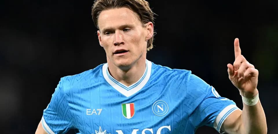 Player celebrating a goal in Napoli jersey