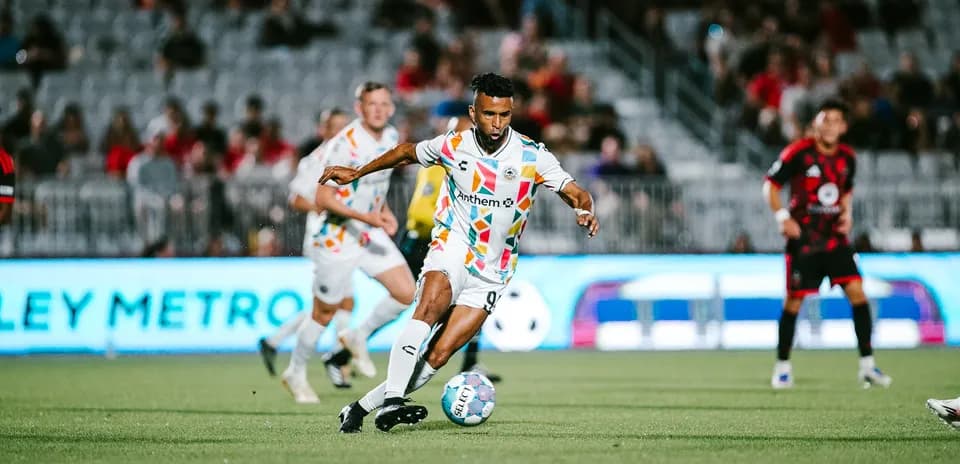 Player dribbling the ball during match