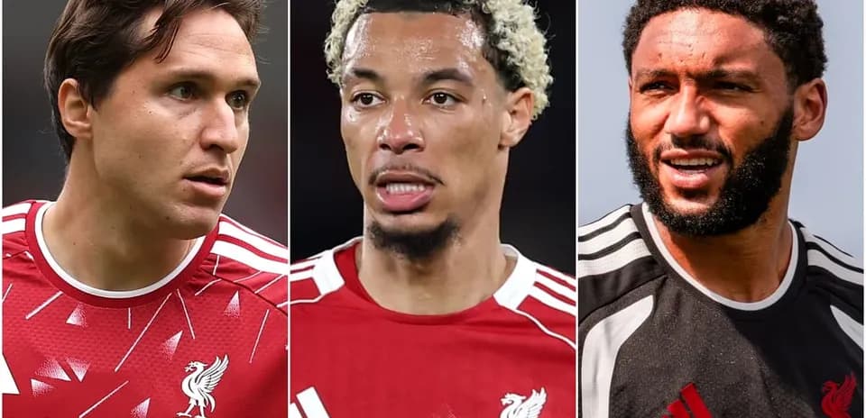 Three Liverpool players in team kits looking forward