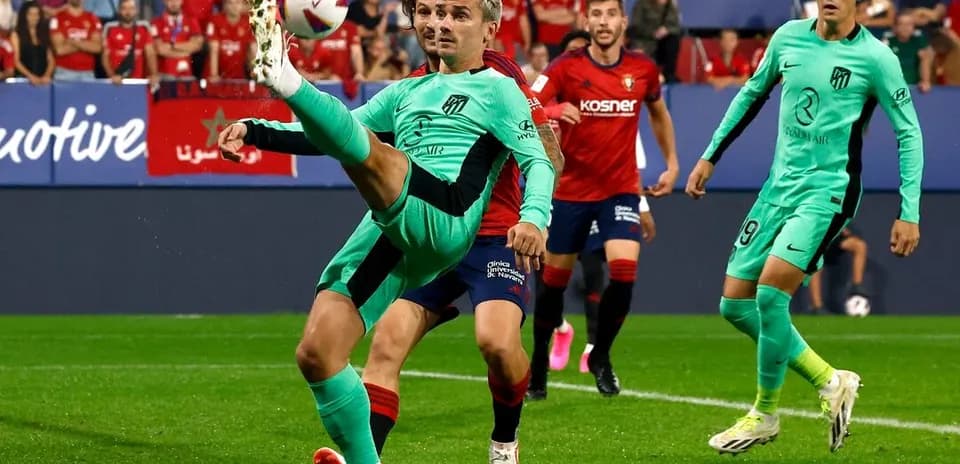 Antoine Griezmann kicking the ball during match