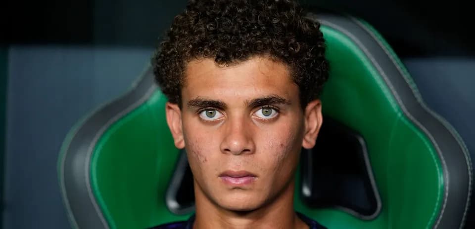 Young player seated in a gaming chair