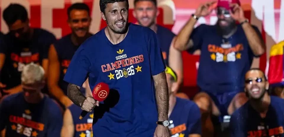 Player celebrating with teammates at victory event