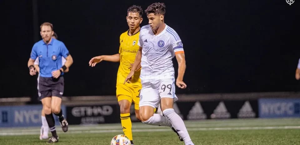 New York City II player dribbling against Columbus Crew II