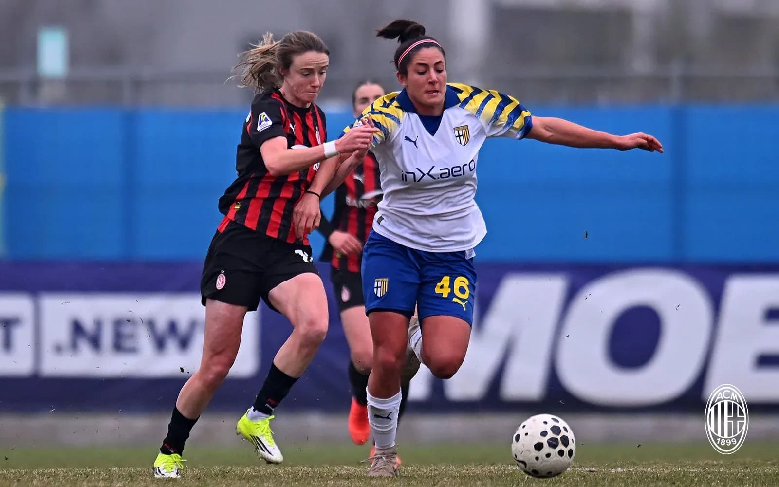 AC Milan and Parma players contesting the ball