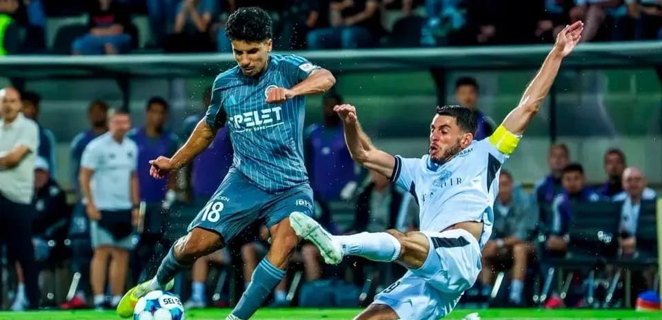 Player tackling during Slovan Bratislava match