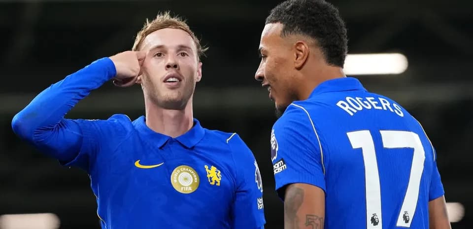 Two players celebrating during a football match
