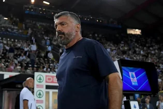 Coach observing the match from the sidelines