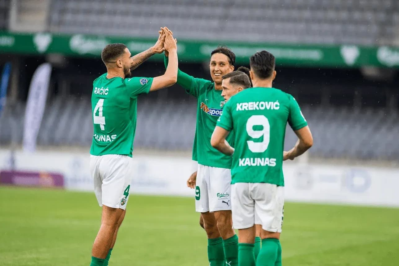 Players celebrating during Kauno Žalgiris match