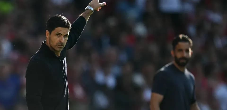 Manager gesturing during match with assistant coach