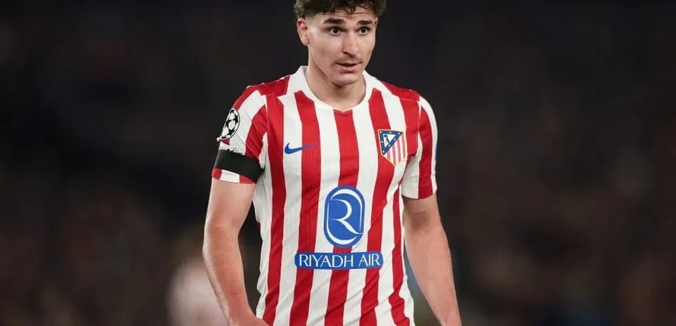 Player in Atlético Madrid jersey during match