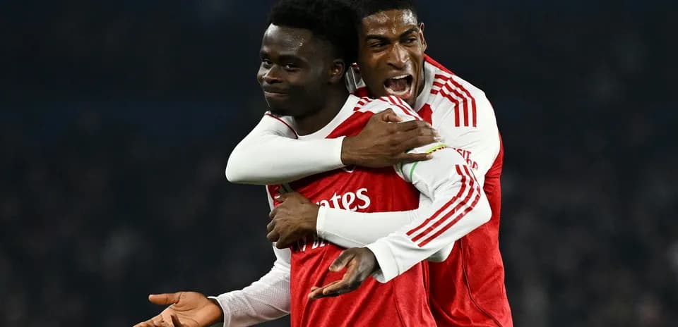 Arsenal players celebrating a goal during match