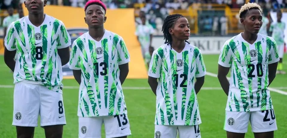 Nigerian female football players lined up before match