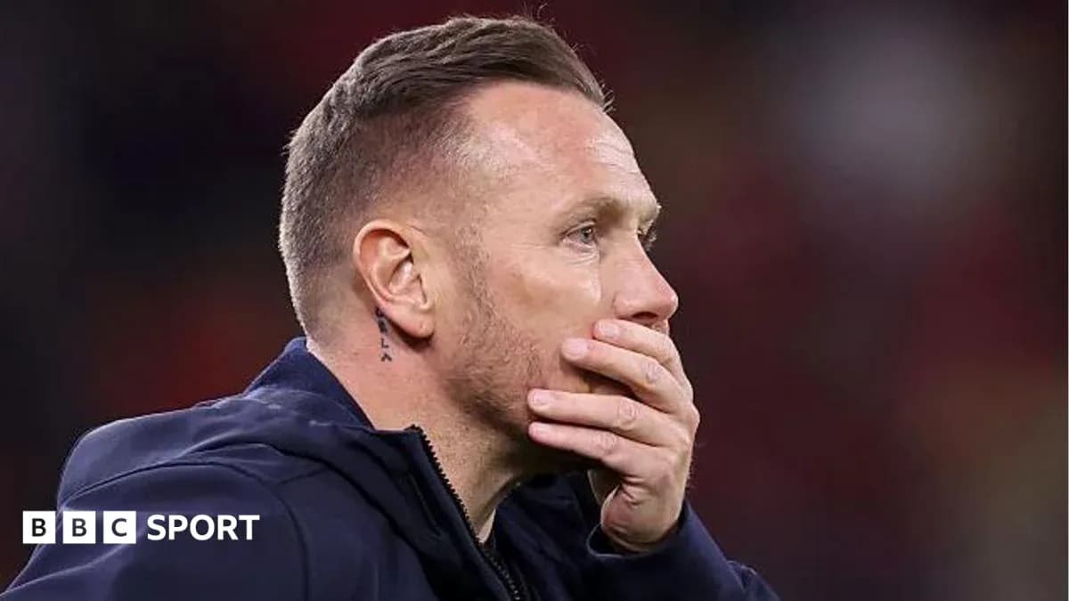 Coach looking thoughtful during a match