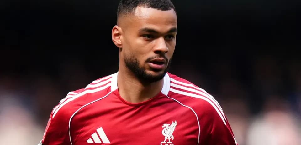 Player in red Liverpool kit during match