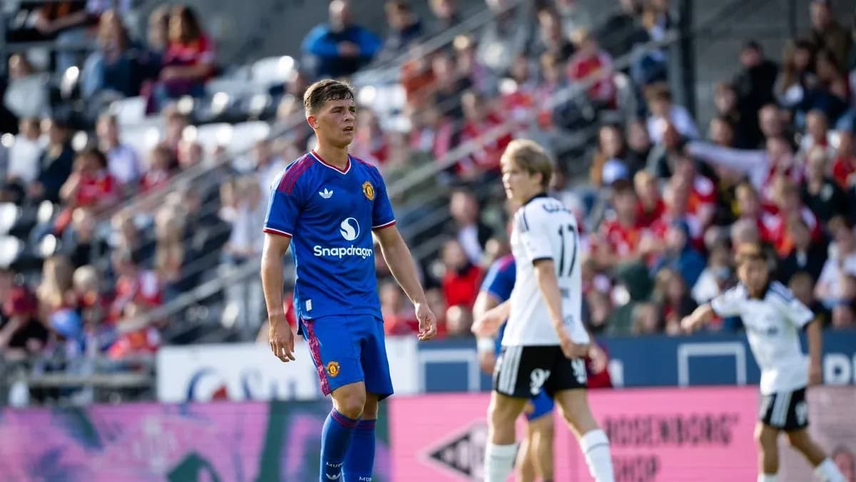 Manchester United player in blue jersey during match