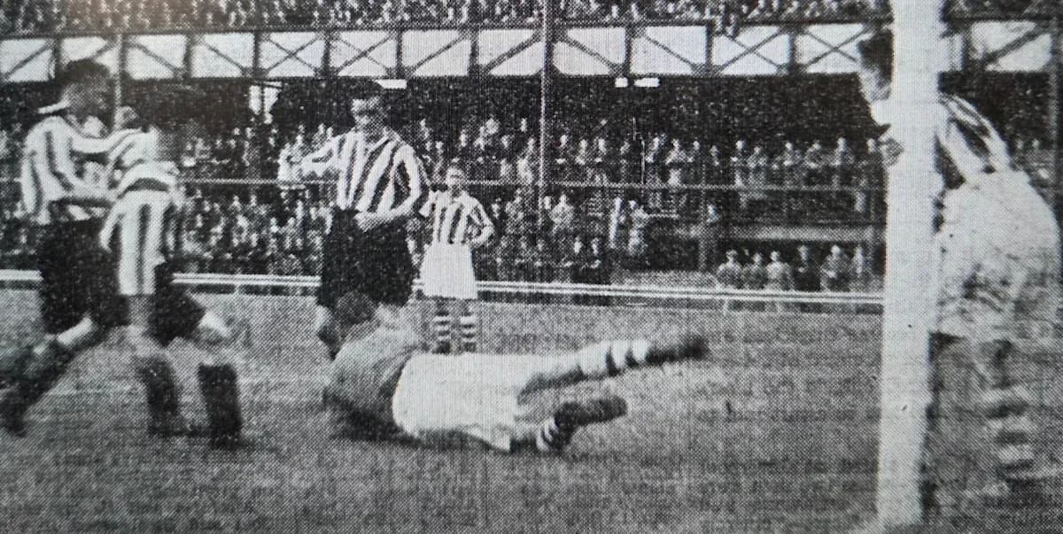 Players competing during a historic football match