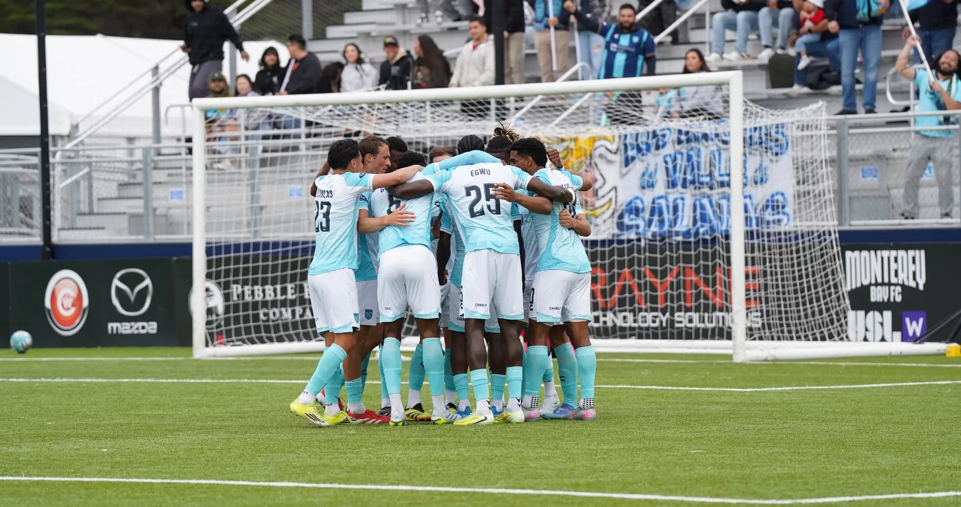 Monterey Bay players celebrating a goal