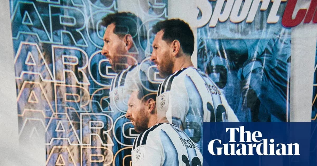Lionel Messi standing in front of promotional backdrop