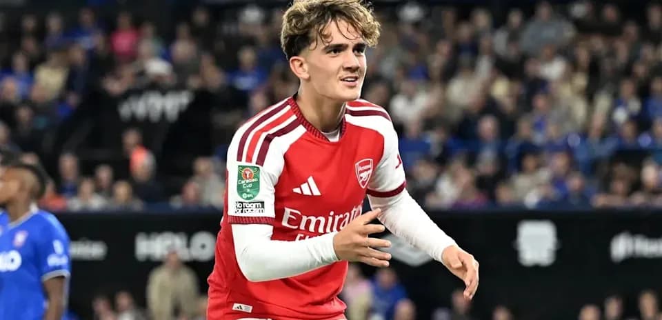 Arsenal player celebrating during match at stadium