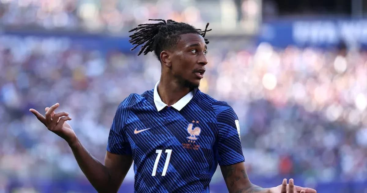 Player in France jersey gesturing during match