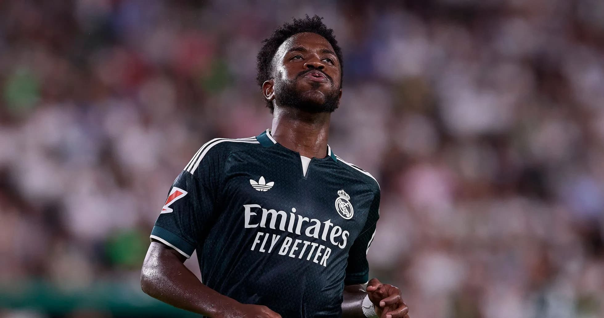 Player in Real Madrid jersey during match