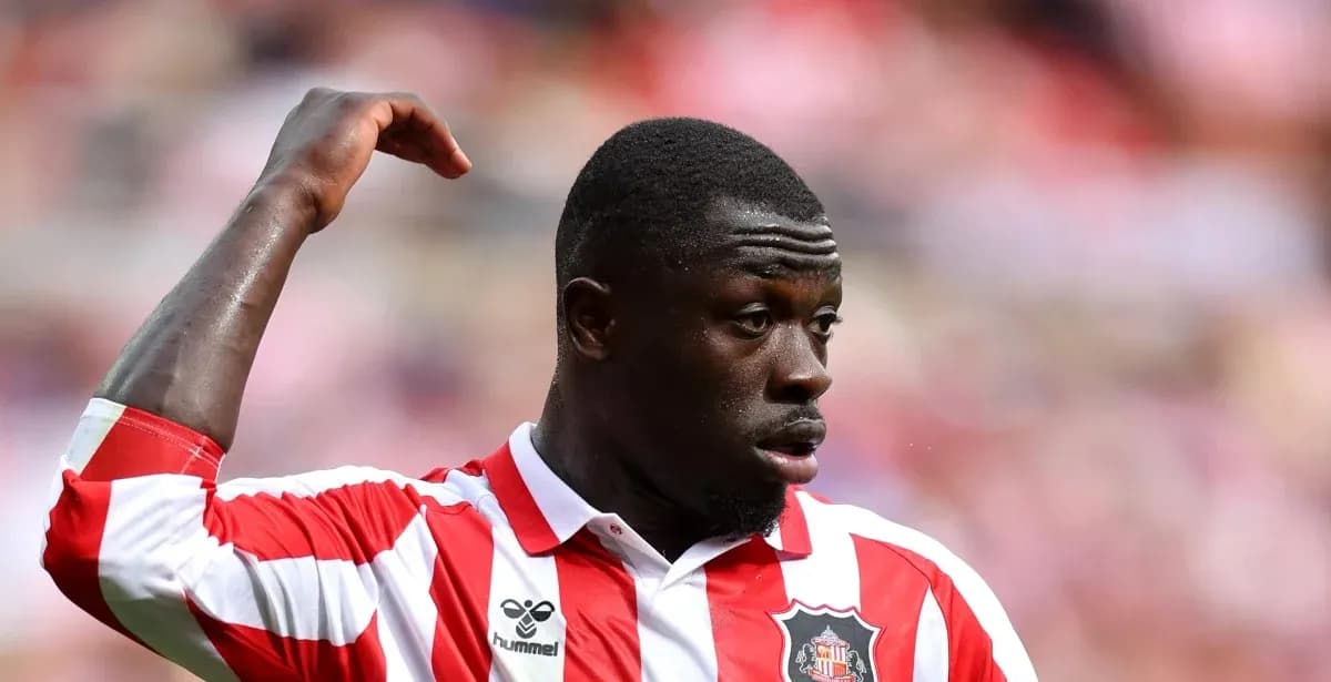 Player gesturing during match in Sunderland kit