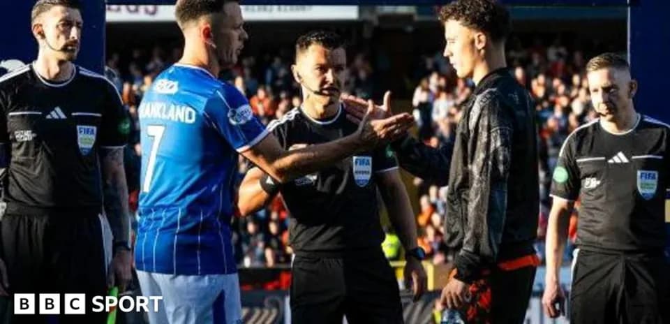 Players shaking hands before the match with referees