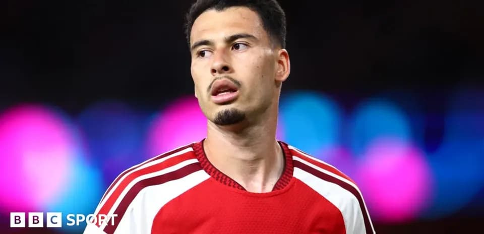 Football player in Arsenal kit during match