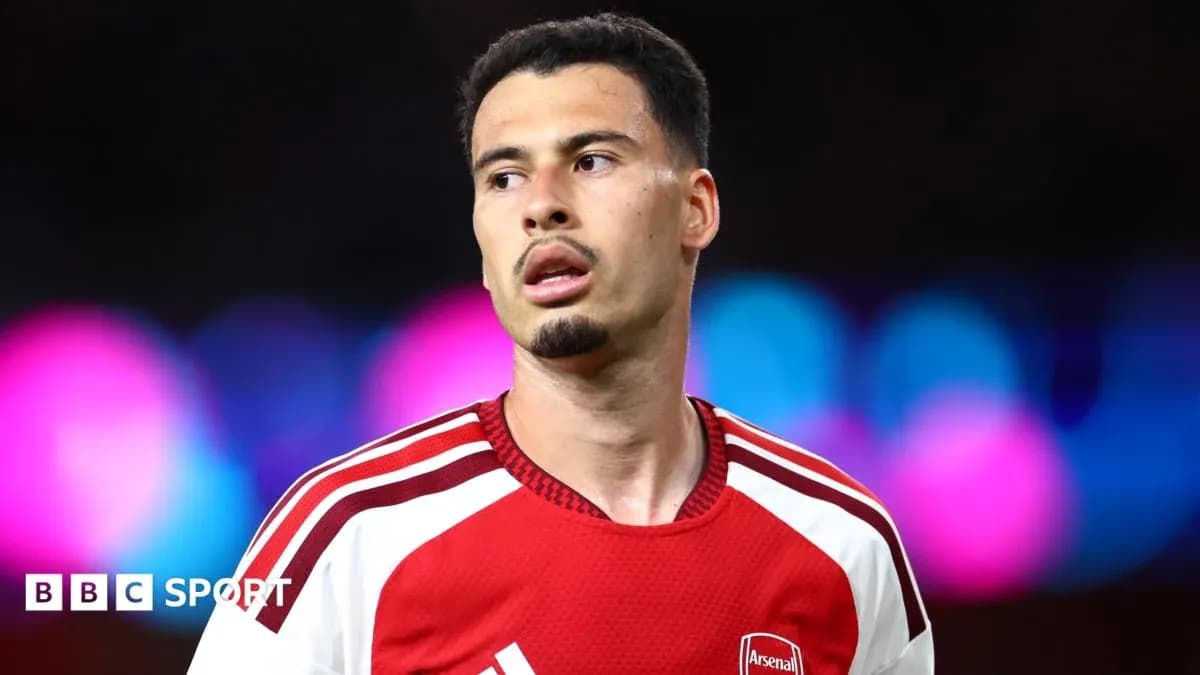 Football player in Arsenal kit during match