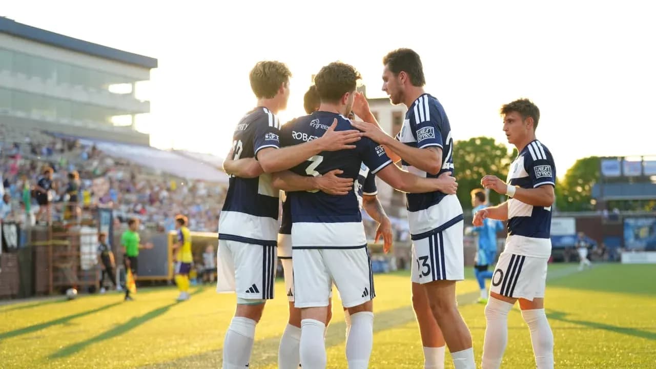 Players celebrating a goal during MLS Next Pro match