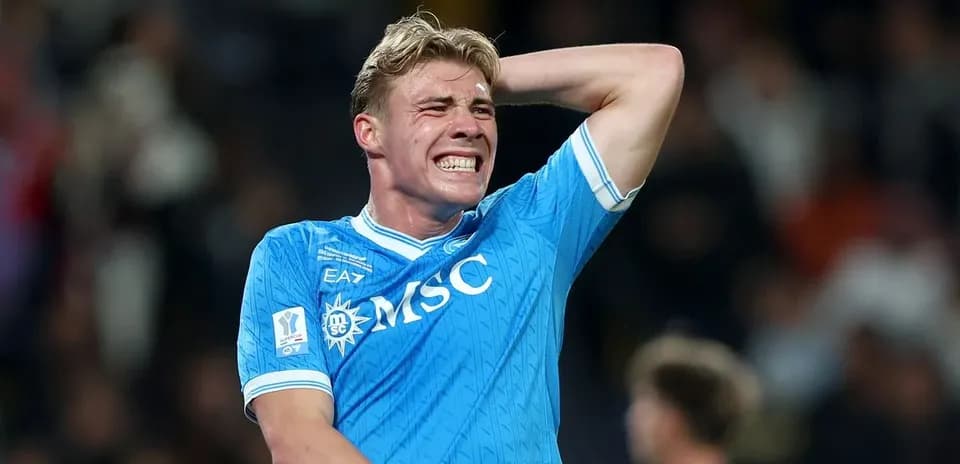 Player in blue jersey reacting during match