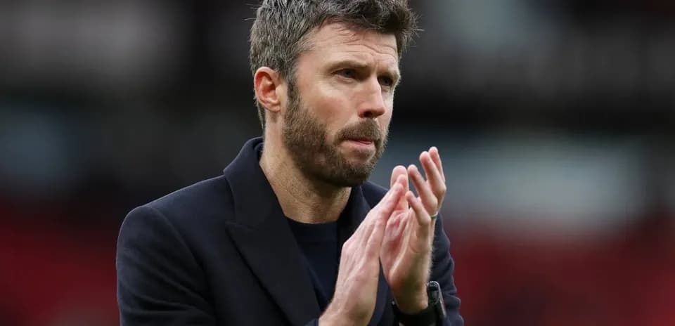 Coach clapping during a match at stadium