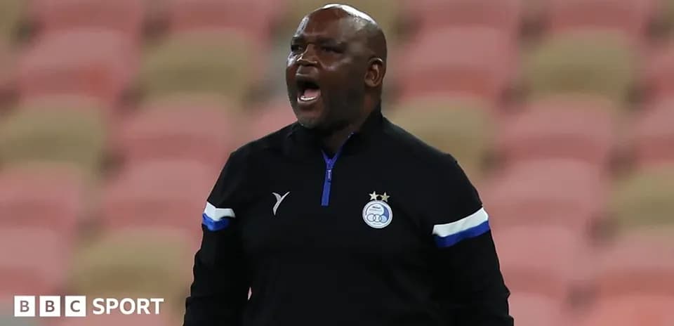 Coach shouting from the sidelines during match