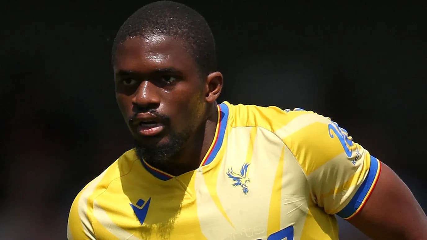 Player in yellow jersey running on the field