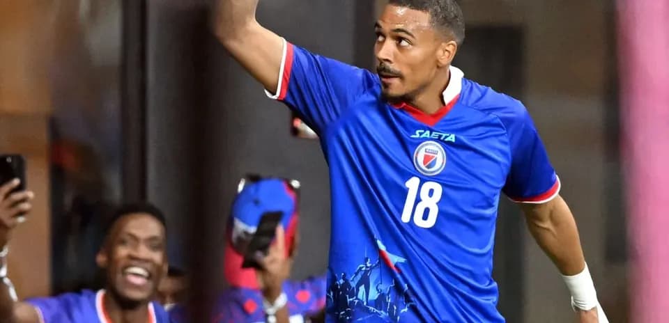 Haitian player celebrating during World Cup match