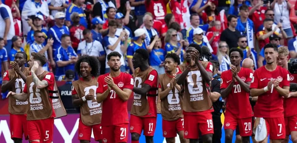 Canadian players applauding fans after the match