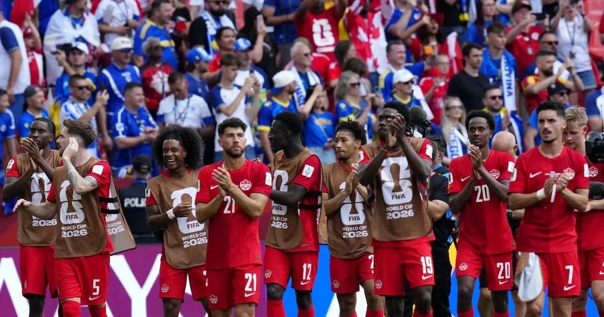 Canadian players applauding fans after the match