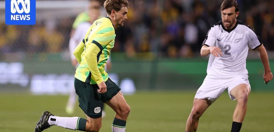Player dribbling past opponent during soccer match
