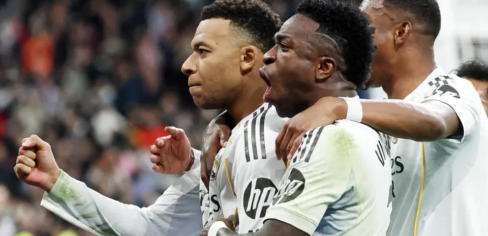 Real Madrid players celebrating a goal