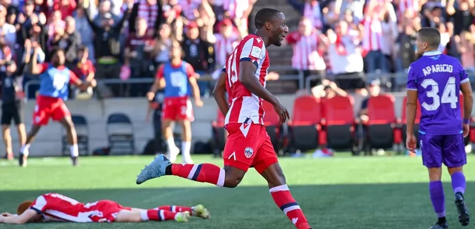 Player celebrating goal during Pacific FC match