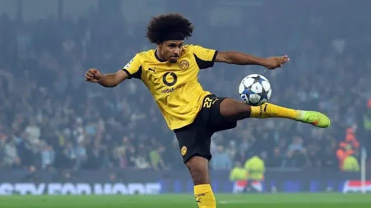 Player kicking ball during UEFA Champions League match