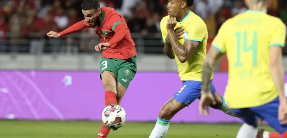 Moroccan player shooting during Brazil match