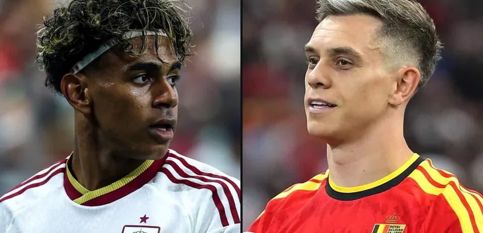 Two football players from Spain and Belgium in uniforms