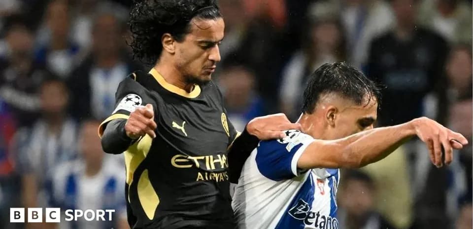 Two players competing for the ball during match