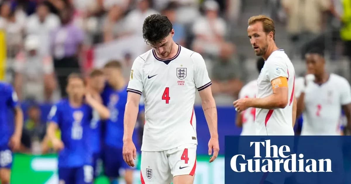 England players walking off the pitch after defeat