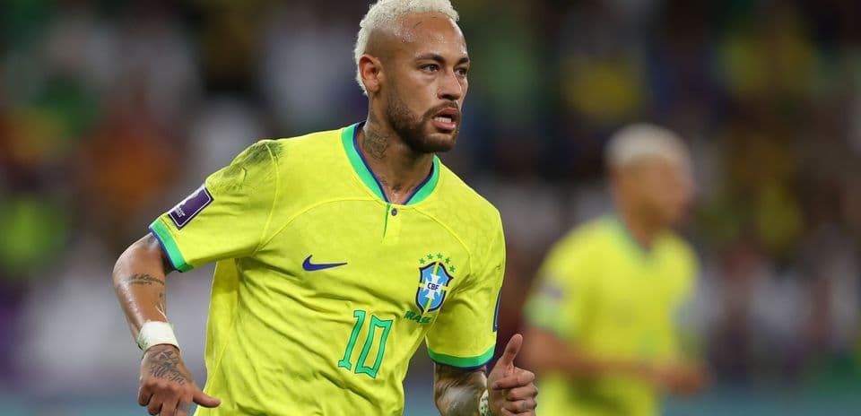 Neymar celebrating in Brazil's yellow jersey during match