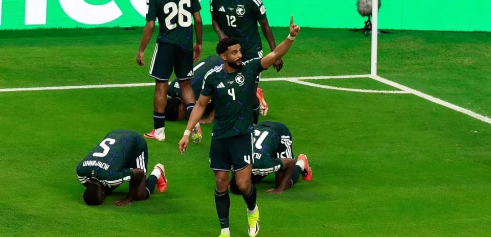 Saudi players celebrating after scoring a goal